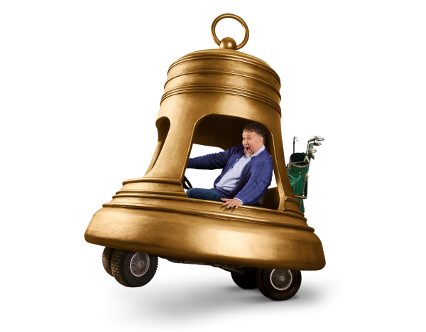 Man driving a golden bell shaped golf buggy