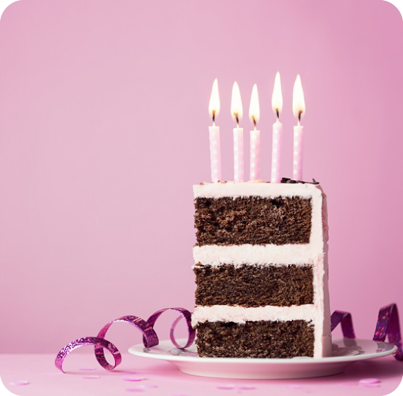 slice of cake with candles